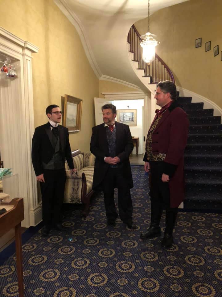 2019 Victorian Halloween Party at the Georgian - three men standing by spiral staircase