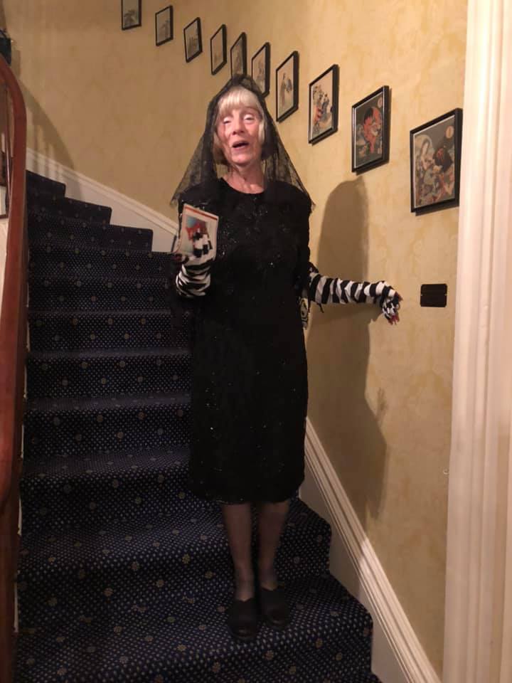 2019 Victorian Halloween Party at the Georgian - lady in black dress on staircase