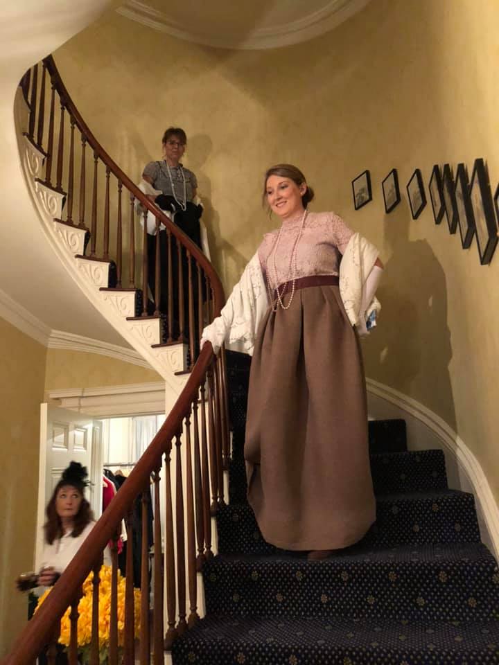 2019 Victorian Halloween Party at the Georgian - two women walking down a staircase